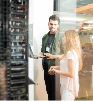 Team reviewing server infrastructure for premium hosting