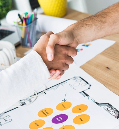 Business partnership handshake representing trusted collaboration